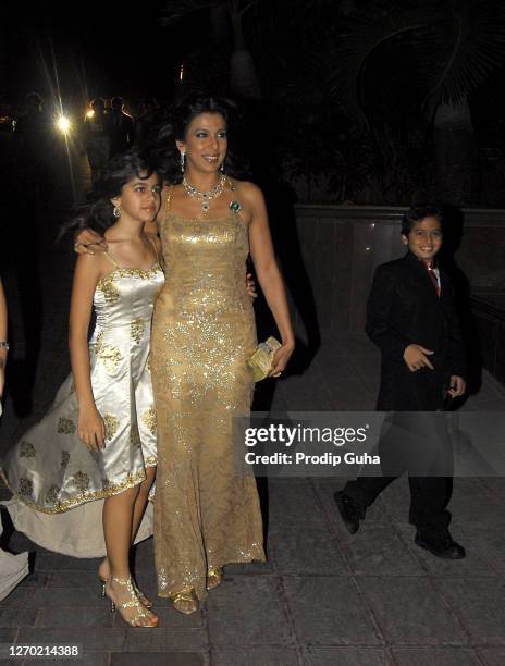 Pooja Bedi and her childrens attend the Laila Khan and Farhan Furniturewallah wedding reception on April 16, 2010 in Mumbai, India.