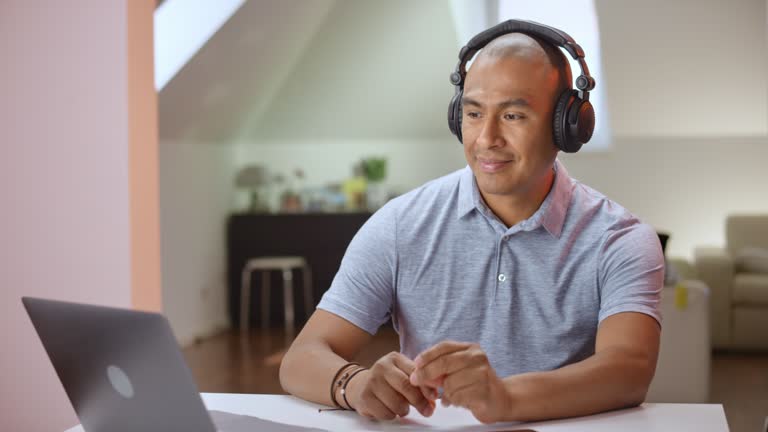 Watching On Computer Watching Computer With Headphones Videos and HD Footage - Getty Images