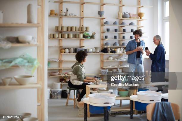 male and female students in art class - art room stock pictures, royalty-free photos & images