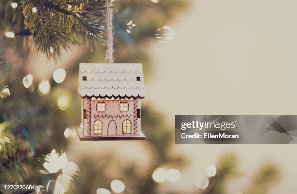 hanging house ornament - christmas house stock pictures, royalty-free photos & images