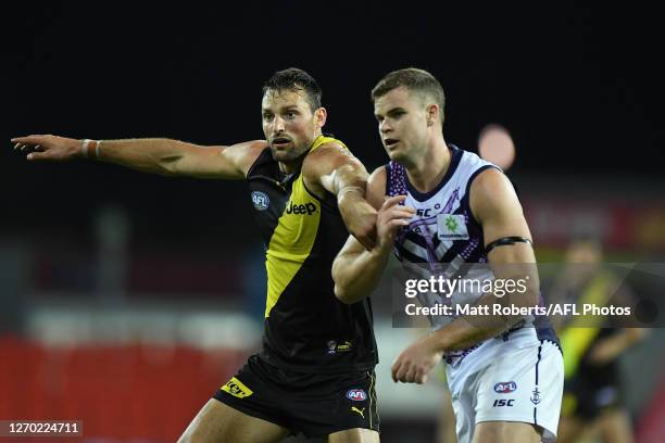 Toby Nankervis of the Tigers competes for the ball against Sean Darcy of the Dockers during the round 15 AFL match between the Richmond Tigers and...