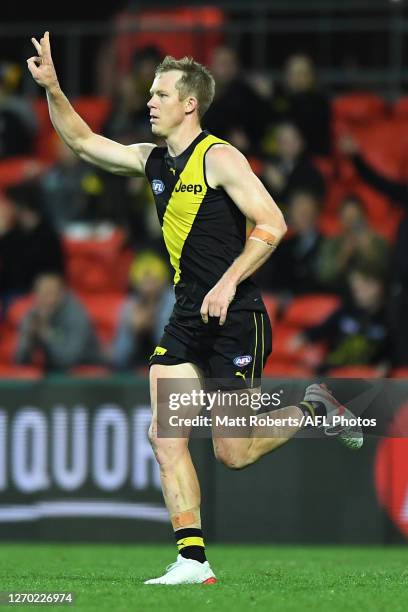 Jack Riewoldt of the Tigers celebrates kicking a goal during the round 15 AFL match between the Richmond Tigers and the Fremantle Dockers at Metricon...