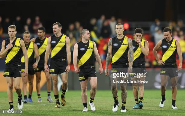 The Tigers walk off after they defeated the Dockers during the round 15 AFL match between the Richmond Tigers and the Fremantle Dockers at Metricon...