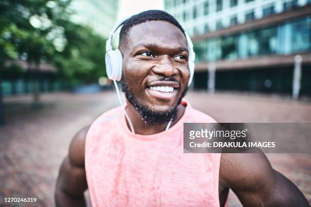 portrait of active african muscular man - black male bodybuilders stock pictures, royalty-free photos & images
