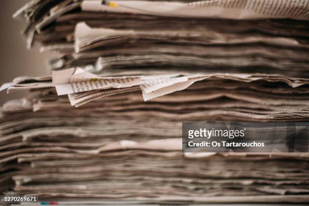 newspaper stack - newspaper stack stock pictures, royalty-free photos & images