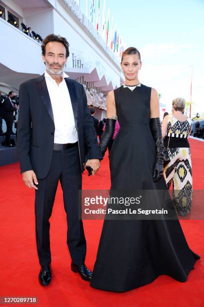 Sveva Alviti and Anthony Delon walk the red carpet ahead of the Opening Ceremony and the "Lacci" red carpet during the 77th Venice Film Festival at...