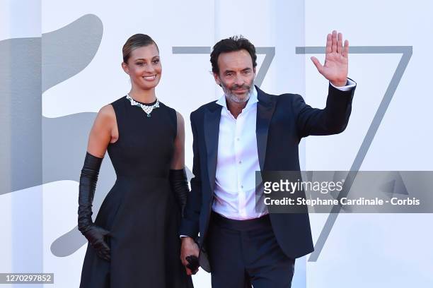 Sveva Alviti and Anthony Delon walk the red carpet ahead of the Opening Ceremony and the "Lacci" red carpet during the 77th Venice Film Festival at...