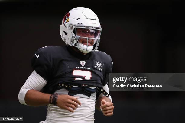 Quarterback Brett Hundley of the Arizona Cardinals runs on the field during a NFL team training camp at State Farm Stadium on September 02, 2020 in...