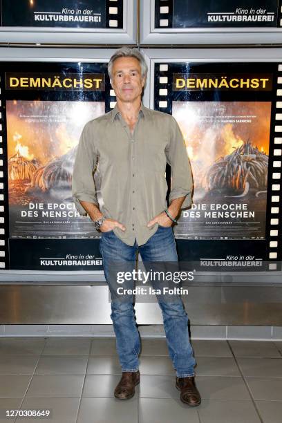 German actor and environmentalist Hannes Jaenicke attends the premiere of "Die Epoche des Menschen" at Kulturbrauerei on September 2, 2020 in Berlin,...