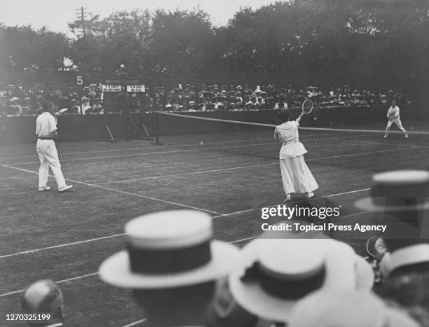 American tennis player Elizabeth Ryan partners British tennis player Arthur Gore against Stanley Doust and Dorothea Lambert Douglass Chambers in the...