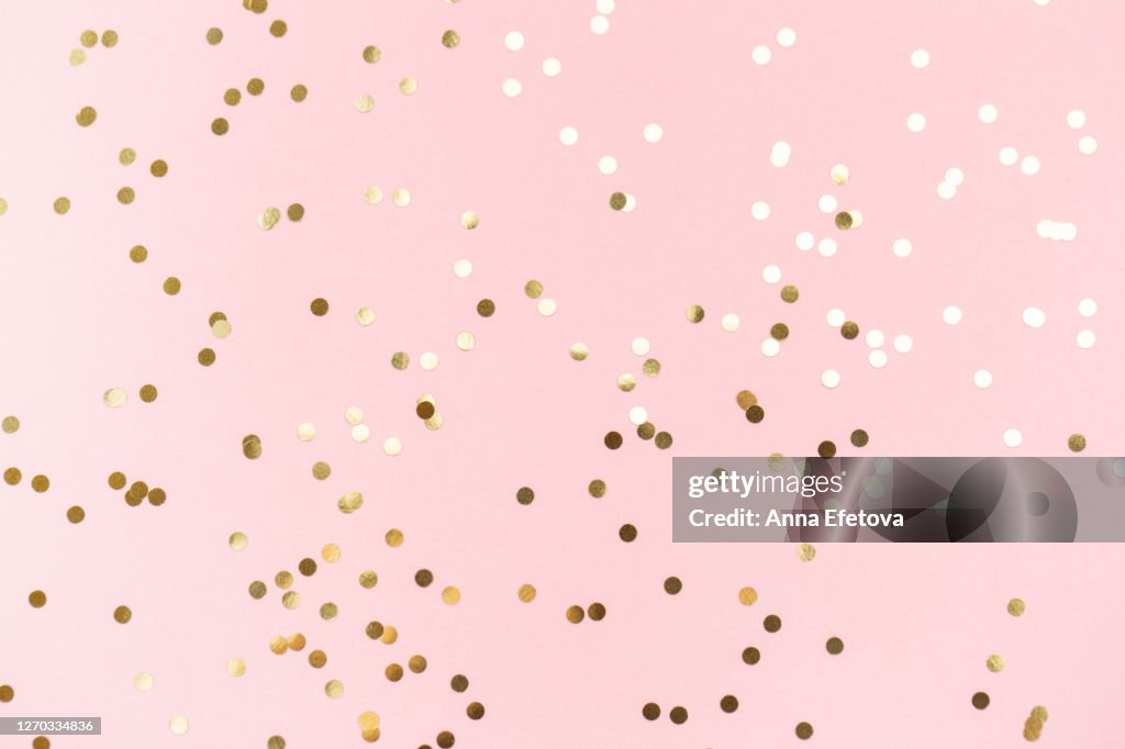 Round confetti on pink background
