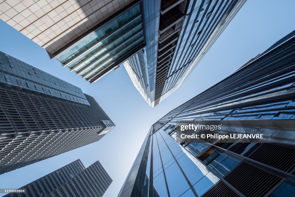 Modern skyscrapers against blue sky low angle view