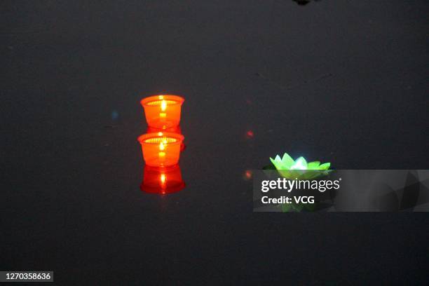 Water lanterns float on the river during the Ghost Festival, also known as Zhongyuan Festival, on September 2, 2020 in Xiaogan, Hubei Province of...