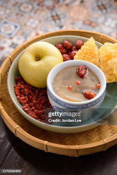 snow pear white fungus soup - chinese herbal medicine stock pictures, royalty-free photos & images