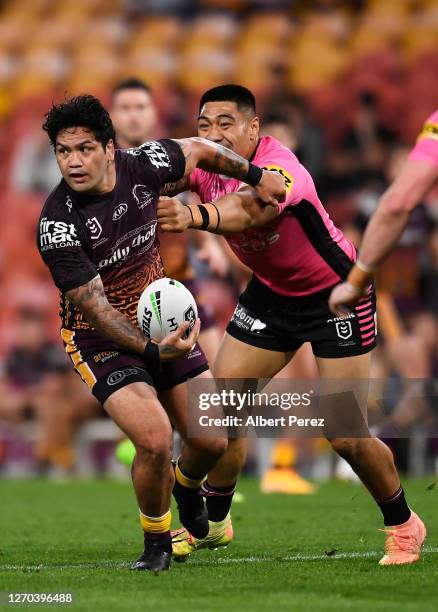 Issac Luke of the Broncos is tackled during the round 17 NRL match between the Brisbane Broncos and the Penrith Panthers at Suncorp Stadium on...