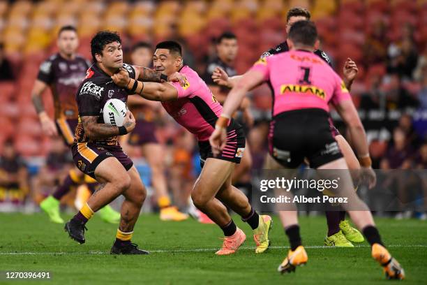 Issac Luke of the Broncos is tackled during the round 17 NRL match between the Brisbane Broncos and the Penrith Panthers at Suncorp Stadium on...