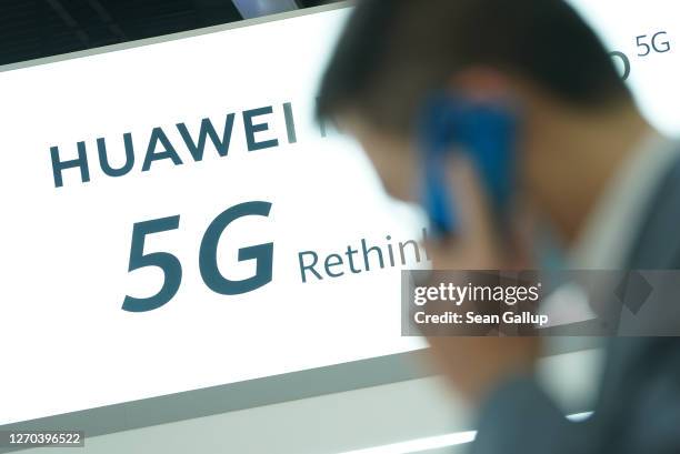 The Huawei stand promotes 5G products at the IFA 2020 Special Edition consumer electronics and appliances trade fair on the fair's opening day on...