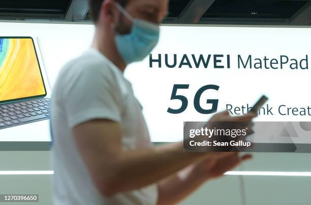 The Huawei stand promotes 5G products at the IFA 2020 Special Edition consumer electronics and appliances trade fair on the fair's opening day on...