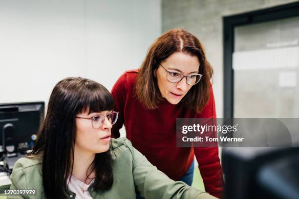 University Students Helping Each Other Photos and Premium High Res ...