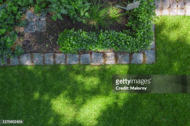 aerial view of lawn and vegetable garde. directly above. drone view. - landscaped stock pictures, royalty-free photos & images