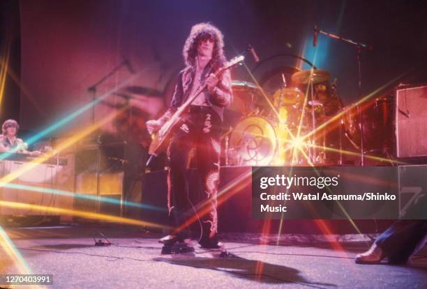 Jimmy Page , of Led Zeppelin performing on stage at Earl's Court, London, May 1975.