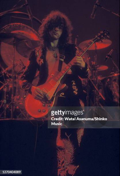 Jimmy Page of Led Zeppelin performing on stage at Earl's Court, London, May 1975.