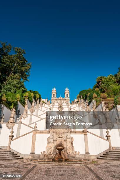 sightseeing landmark, famous baroque staircase in the sanctuary of bom jesus do monte, braga, portugal - braga city stockfoto's en -beelden