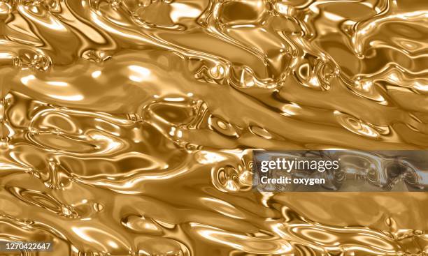 gold fluid melting waves flowing liquid motion abstract background - gold foil texture foto e immagini stock