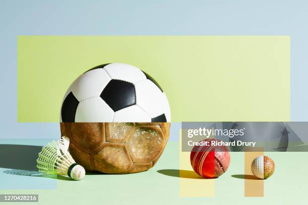 composite image of old and new sports balls - the first time stock pictures, royalty-free photos & images