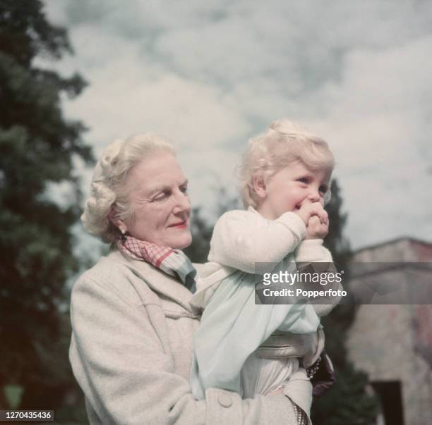 Clementine Churchill , wife of former Prime Minister Winston Churchill, holds her grandaughter Arabella Churchill in the grounds of Chartwell country...