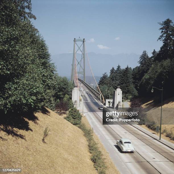 Cars approach Lions Gate Bridge, a suspension bridge that spans the Burrard Inlet, near the city of Vancouver in British Columbia, Canada in...