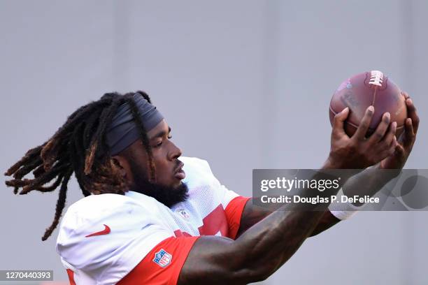 Ronald Jones II of the Tampa Bay Buccaneers makes a reception during training camp at Raymond James Stadium on September 03, 2020 in Tampa, Florida.