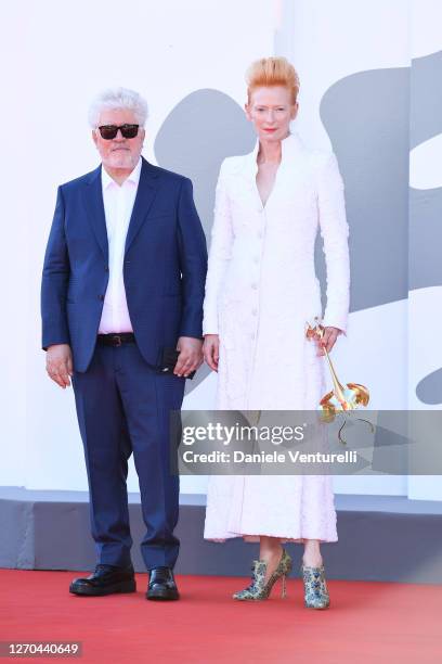 Director Pedro Almodóvar and Tilda Swinton walk the red carpet ahead of the movie "The Human Voice" and "Quo Vadis, Aida?" at the 77th Venice Film...