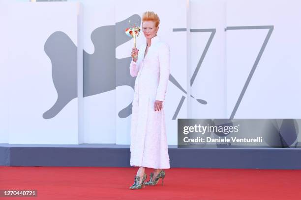 Tilda Swinton walks the red carpet ahead of the movie "The Human Voice" and "Quo Vadis, Aida?" at the 77th Venice Film Festival at on September 03,...