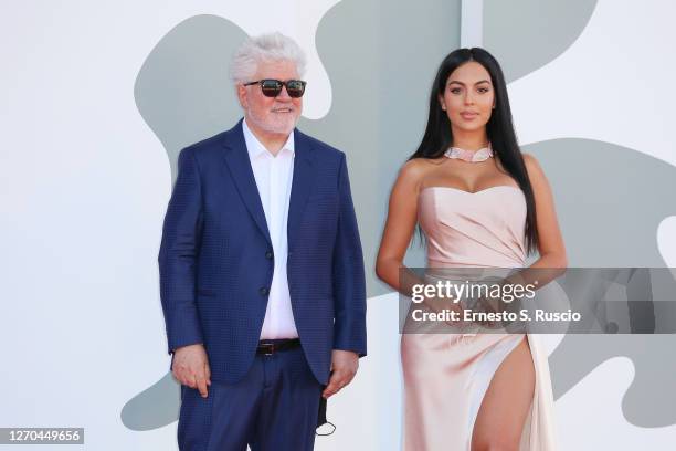 Director Pedro Almodóvar and Georgina Rodriguez walk the red carpet ahead of the movie "The Human Voice" and "Quo Vadis, Aida?" at the 77th Venice...