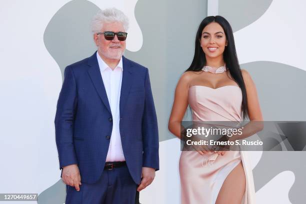 Director Pedro Almodóvar and Georgina Rodriguez walk the red carpet ahead of the movie "The Human Voice" and "Quo Vadis, Aida?" at the 77th Venice...