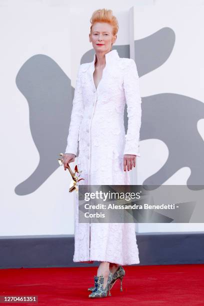 Tilda Swinton walks the red carpet ahead of the movie "The Human Voice" and "Quo Vadis, Aida?" at the 77th Venice Film Festival at on September 03,...