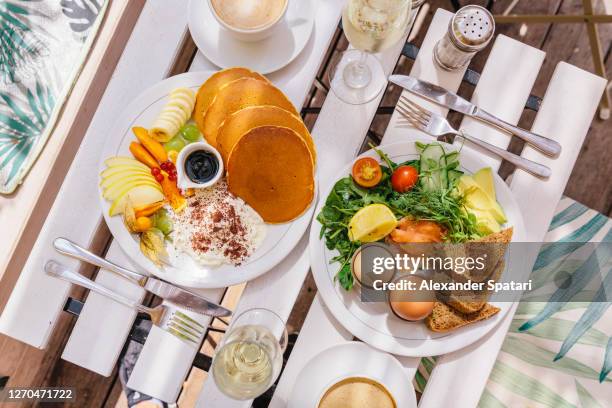 brunch served with coffee and prosecco, directly above view - champagne brunch stock pictures, royalty-free photos & images