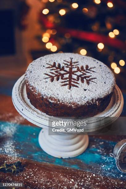 christmas cake with dried fruits and nuts - christmas cake stock pictures, royalty-free photos & images