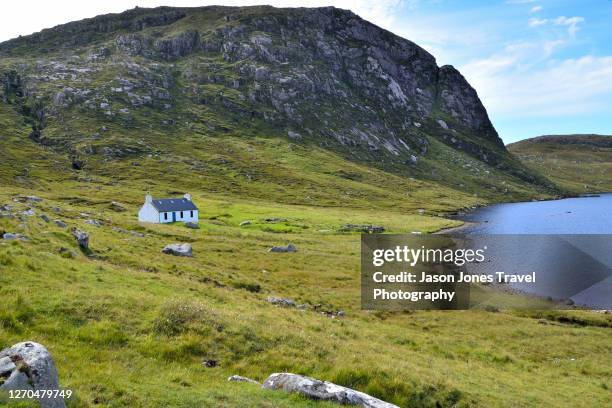 a croft house near loch na cleabhaig on harris - outer hebrides stock pictures, royalty-free photos & images