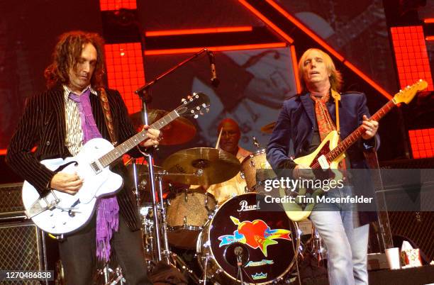 Mike Campbell and Tom Petty of Tom Petty and the Heartbreakers perform at the Greek Theatre on August 26, 2005 in Berkeley, California.