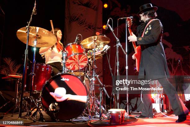 Meg White and Jack White of The White Stripes perform at the Greek Theatre on August 12, 2005 in Berkeley, California.