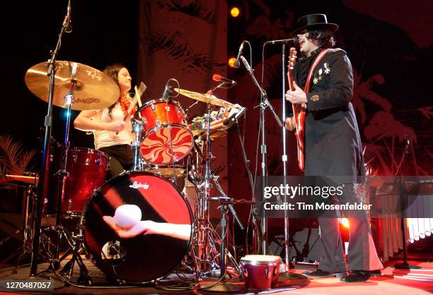 Meg White and Jack White of The White Stripes perform at the Greek Theatre on August 12, 2005 in Berkeley, California.