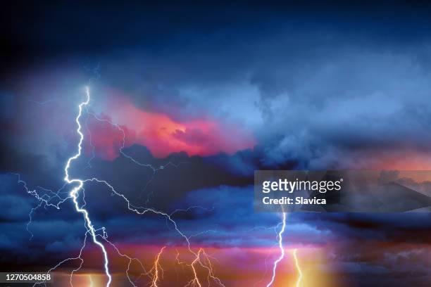 lightning during summer storm - extreme weather stock pictures, royalty-free photos & images