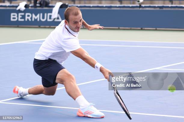 Daniel Evans of Great Britain returns the ball during his Men's Singles second round match against Corentin Moutet of France on Day Four of the 2020...