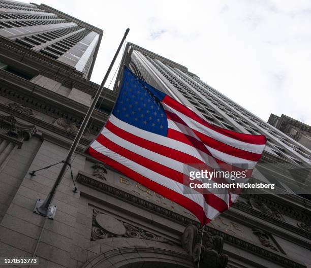 The American flag flies from the Equitable Building September 3, 2020 below Wall Street in the Financial District of New York City. The New York...