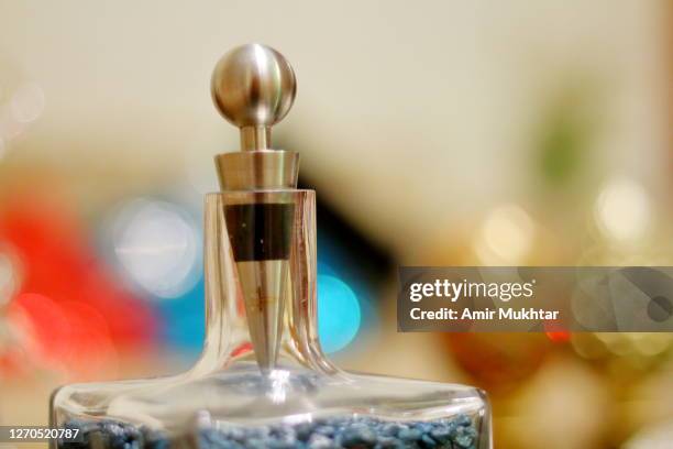 steel bottle stopper on crystal bottle. - bottle stopper stock pictures, royalty-free photos & images