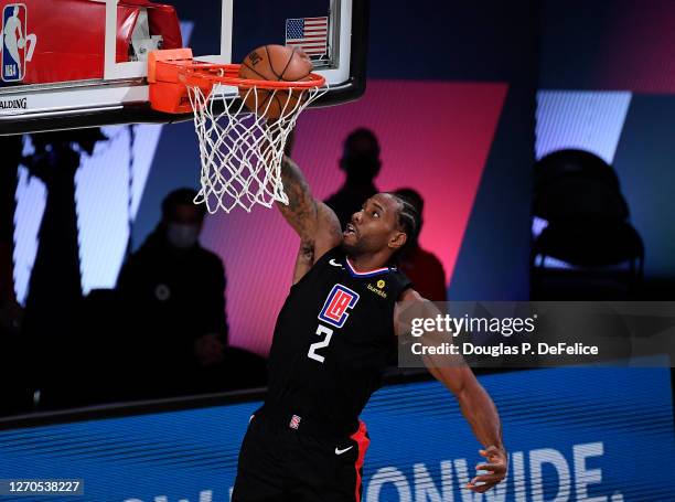 Kawhi Leonard of the LA Clippers dunks the ball during the second quarter against the Denver Nuggets in Game One of the Western Conference Second...