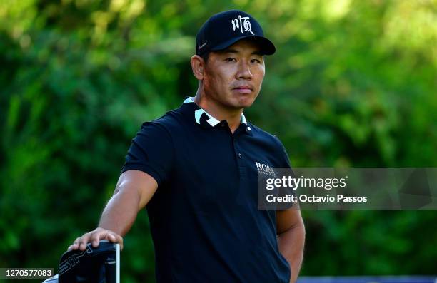 Ashun Wu of China waits to tee off on the third hole during the second round of the Estrella Damm N. A. Andalucia Masters at Real Club Valderrama on...