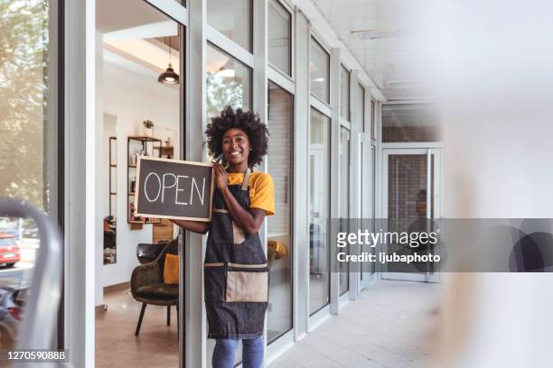 we're now open for business - open sign on door stock pictures, royalty-free photos & images